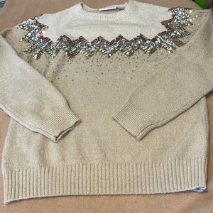 Used girls sweater size L (10/12)